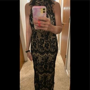 This blace lace black dress is a size small from Souther fried Chicks.